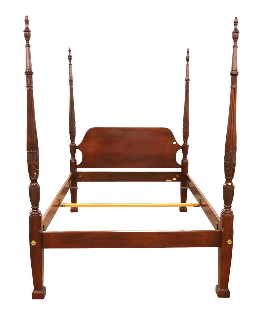 Quality Councill 4 poster queen size bed: Quality Councill Furniture carved solid mahogany 4 poster queen size bed, bolt together construction, original finish, structurally sound and in good condition. Footprint: 87"h x 64"w x 88"l