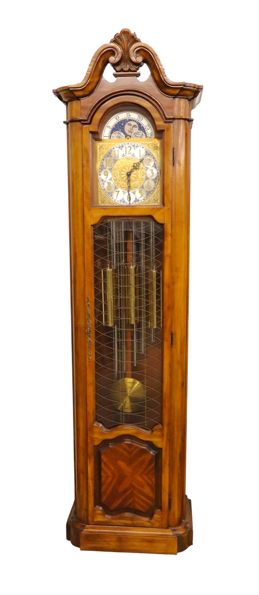 Vintage Ridgeway 5 tube grandfather clock: Vintage Ridgeway 5 tube grandfather clock carved in walnut fiunish, running in home, structurally sound and in good condition with weights and pedulum. 85.5"h x 24"w x 15"d