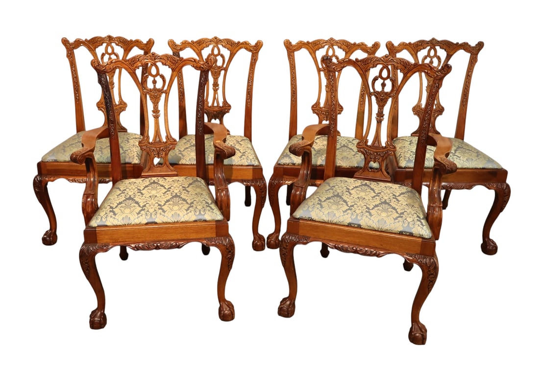 Set 6 highly carved Chippendale dining chairs: Set of 6 highly carved solid mahogany Chippendale ball and claw dining chairs, upholstery looks good, structurally sound and in good condition. (2) Arm chairs 39.5"h x 26"w x 20"d (4) Side chairs 38.5