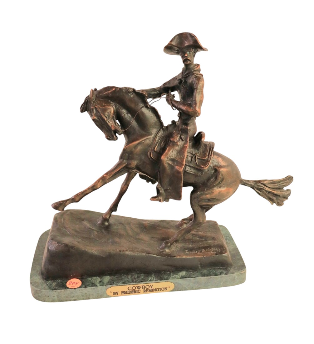 Frederick Remington bronze "The Cowboy" signed: Signed Frederick Remington bronze on marble "The Cowboy". 13"h x 12"l x 5.5"w