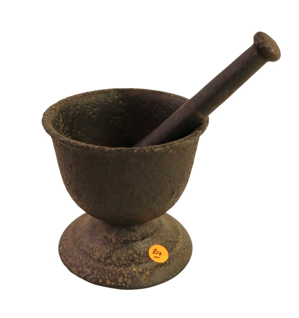 Antique cast iron mortar and pestle: Antique cast iron mortar and pestle. 6"h x 6" diameter
