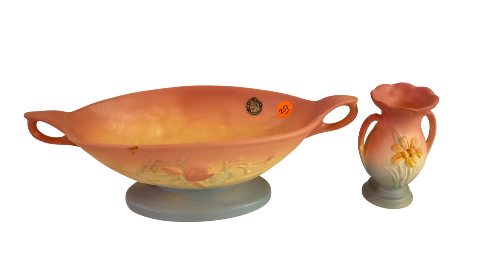 2 Hall art pottery: double handled bowl and vase: 2 Hall art pottery, double handled bowl and vase, each has small chip. 4.25"h x 13.5"l x 6"w, 5"h x 3.5" diameter