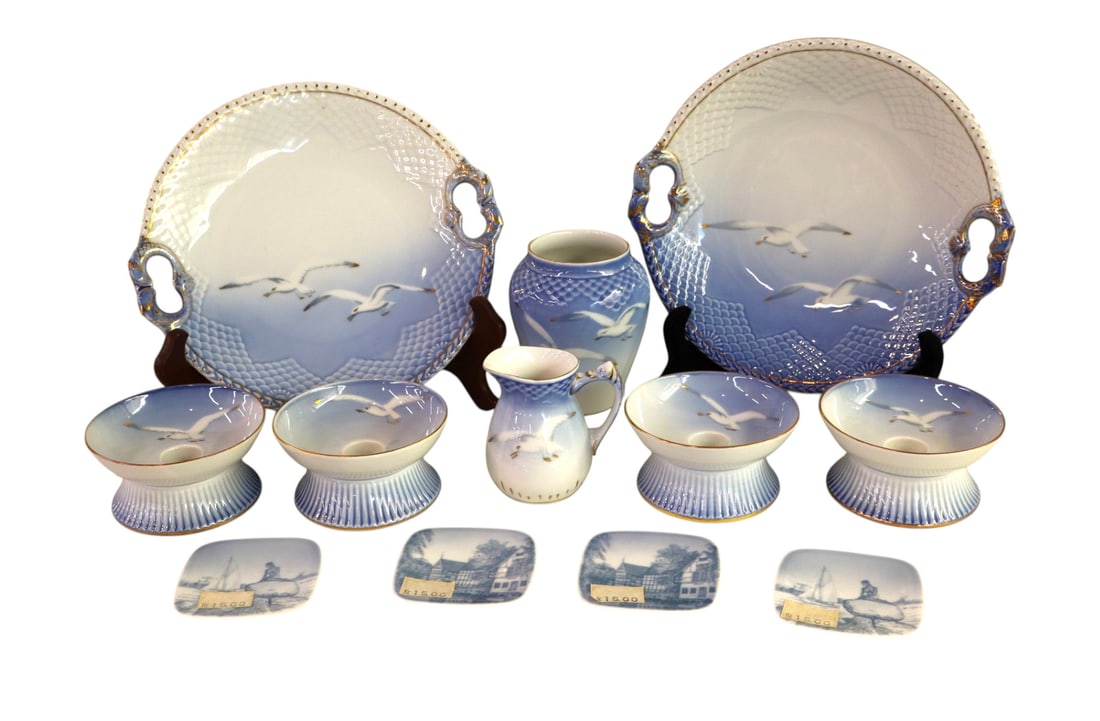 12 vtg. Copenhagen B&G Denmark Seagull decorated porcelain: Vintage Copenhagen B&G porcelain made in Denmark collection of 12 decorated with seagulls candlestands, plates, vase, pitcher and 4 butter plates no noticeable issues.