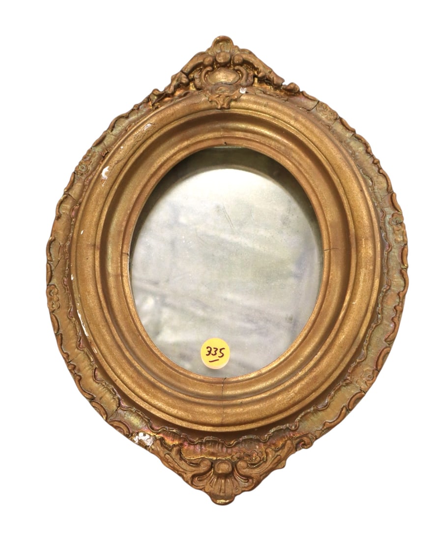 Petite antique oval mirror in wood an gesso: Petite antique oval mirror in wood an gesso. 13"h x 10"w