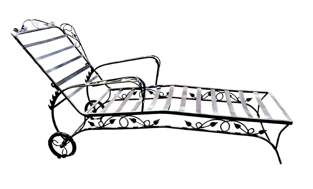 Vintage metal patio lounge chair with adjustable back: Vintage metal patio lounge chair with adjustable back, wheels work as should, vine decorations, structurally sound. 34"h x 31"w x 68"l
