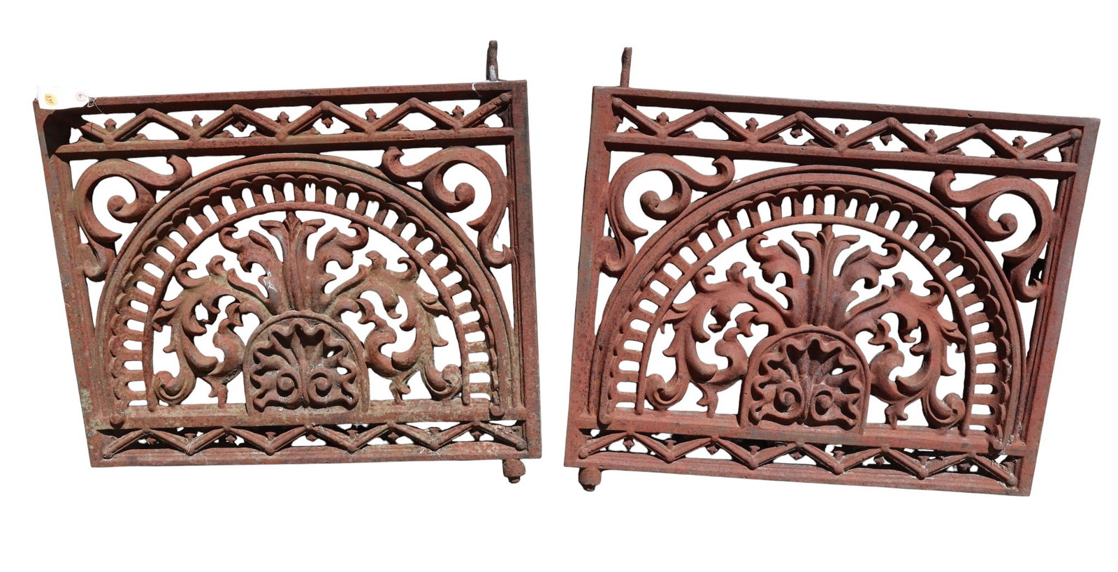 Pair of antique ornate cast iron swinging gates: Pair of antique ornate cast iron swinging gates, structurally sound and in solid condition. 24"h x 27.5"w x 1' thick