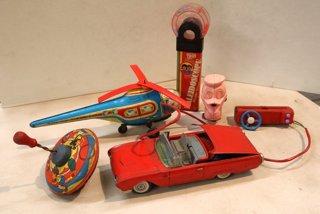 Assortment of vintage press tin toys and other: Assortment of vintage press tin toys and other