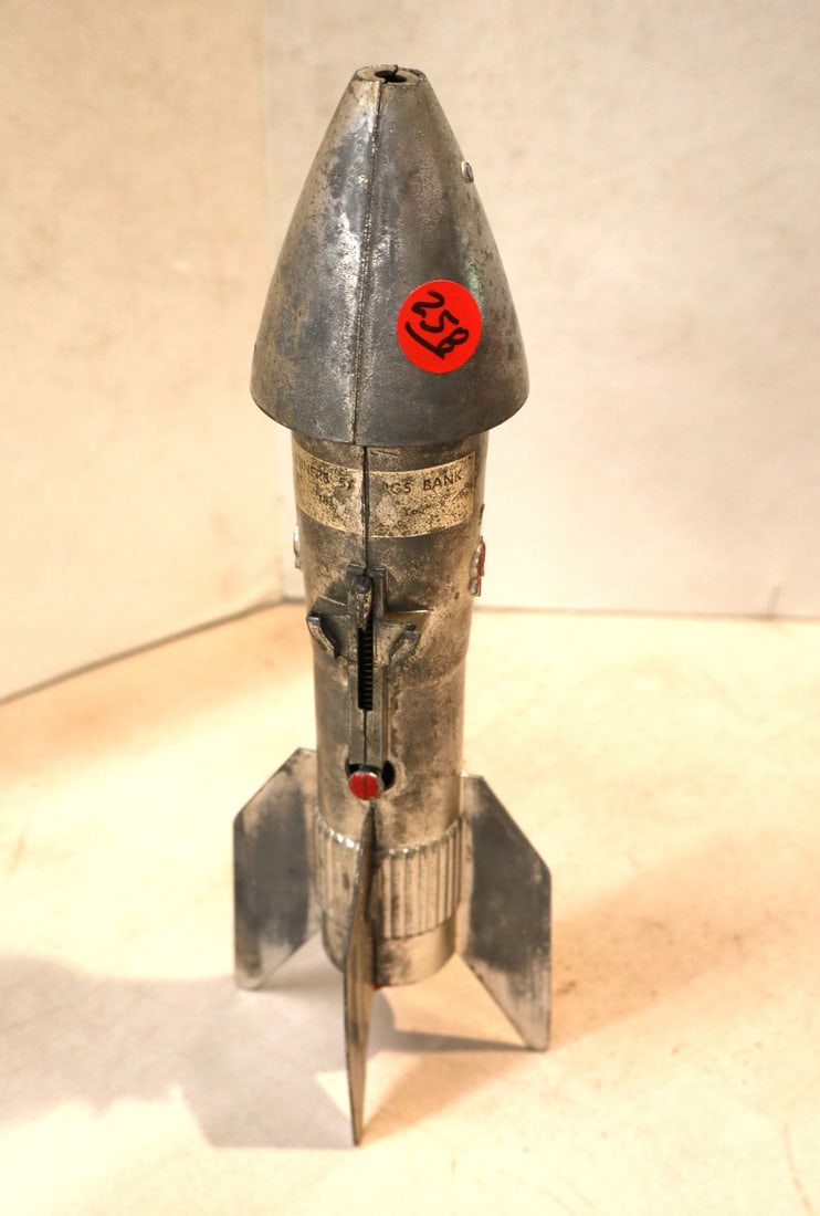 Vintage rocket mechanical bank in the aluminum (1 of 3)