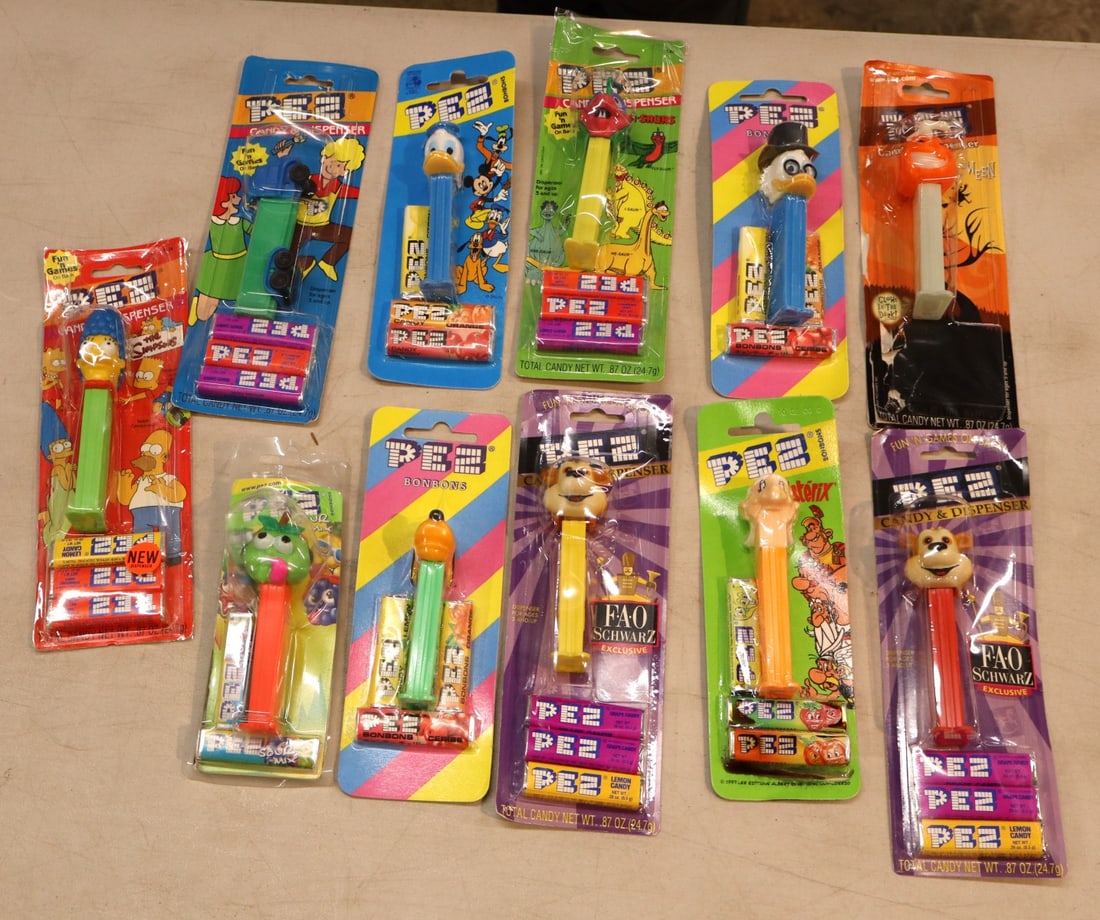 11 vintage PEZ candy dispensers, Simpsons, Halloween, Pez-A-Saurs & other - some factory sealed, (1 of 2)