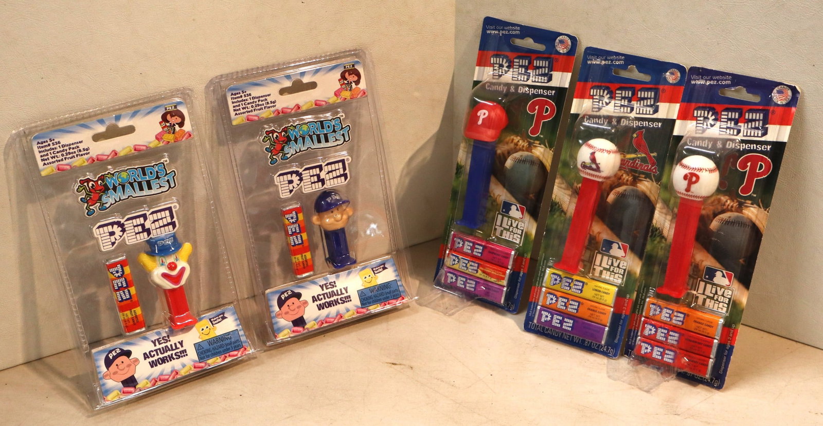 5 vintage PEZ candy dispensers including Philadelphia Phillies, Cardinals and worlds smallest PEZ & (1 of 2)