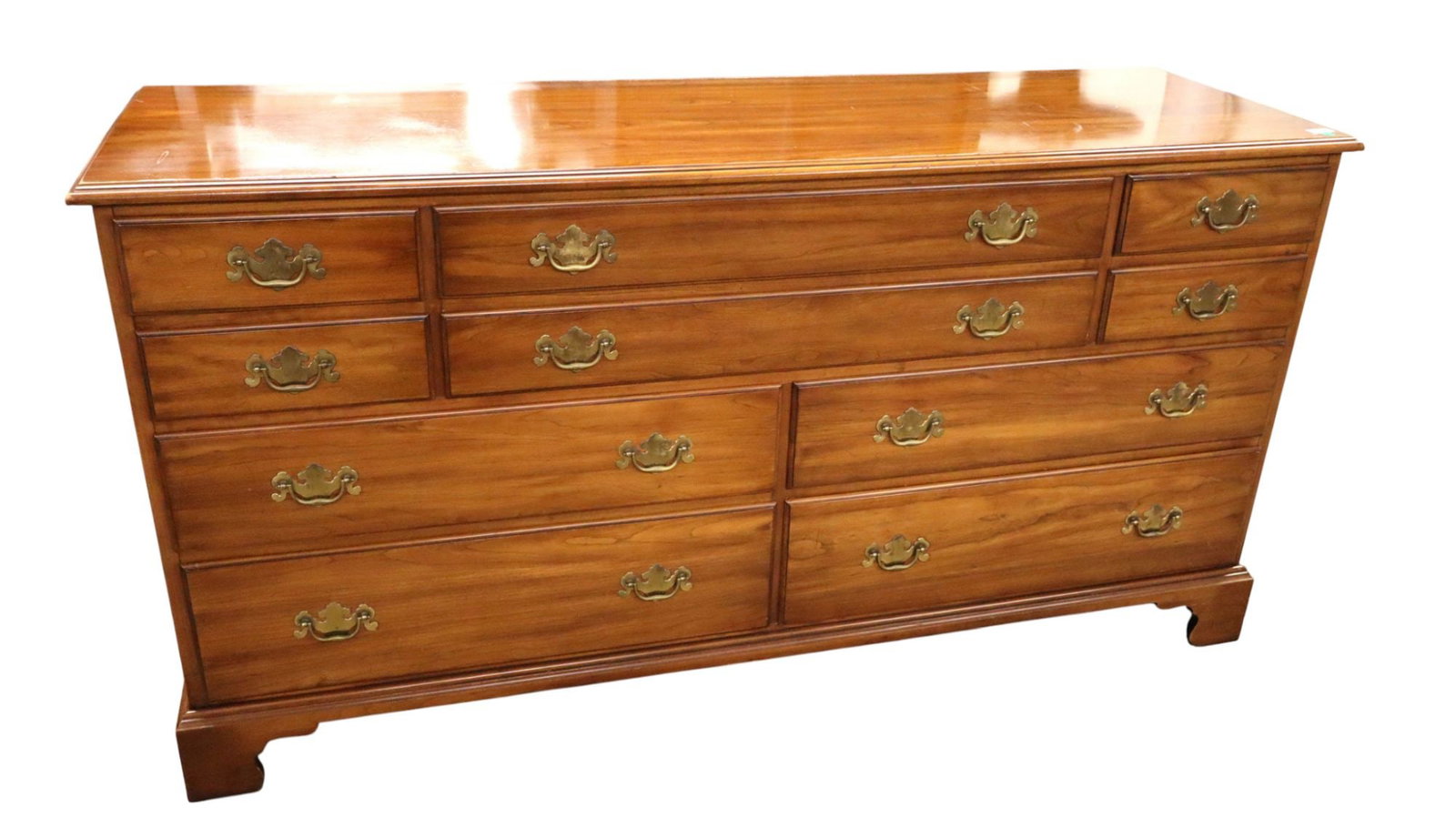 VA Galleries Henkel Harris solid cherry low chest: Virginia Galleries Furniture by Henkel Harris 10 drawer solid cherry low chest, original finish, structurally sound and in good condition with some slight wear on top. 34"h x 66"w x 20.5"d