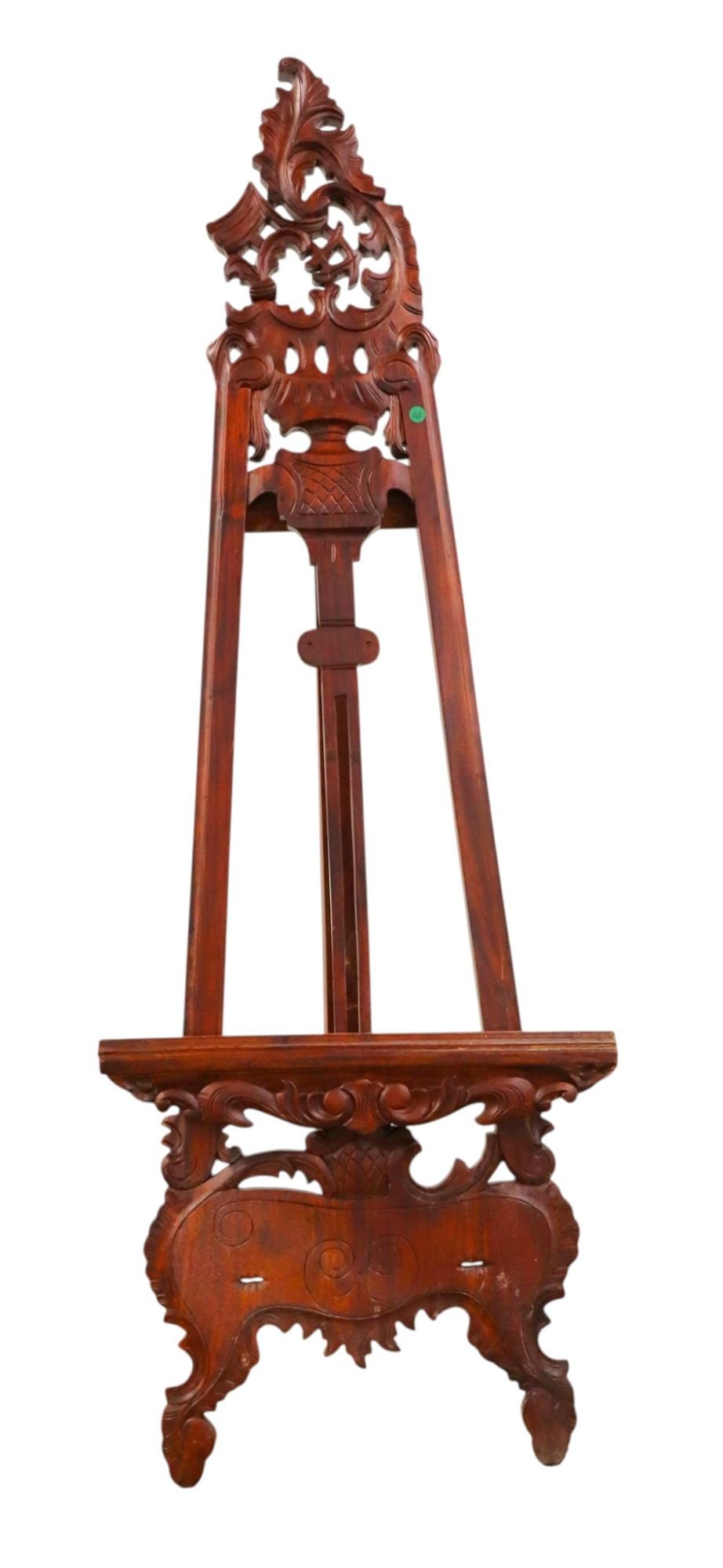 Hand carved solid mahogany adjustable easel: Hand carved solid mahogany adjustable easel with custom made extra finger, original finish, structurally sound and in good condition. 65"h x 24"w x adjustable depth