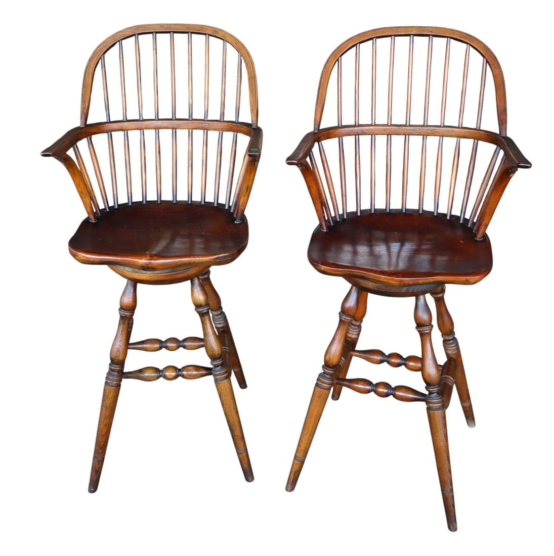Quality PR swivel Windsor style high back stools: Quality pair of swivel windsor style high back stools in the chestnut and oak, works and should, original finish, structurally sound, sturdy. 48.5"h x 22"w x 18.5"d seat height of 29.5"