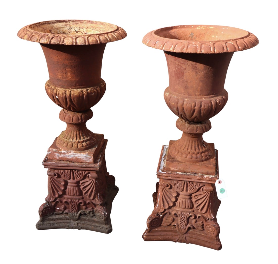 Match PR vintage CI 2 part ornate garden urns: Match pair of vintage cast iron 2 part ornate garden urns, structurally sound have been painted over the years has chips in rims see photos. Ea. 31.5"h x 16" diameter x 19.5"h urn, base 12"h x 12.5" x