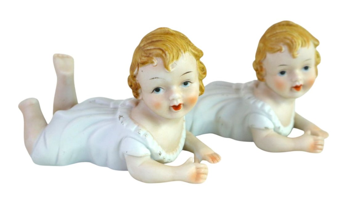 PR vtg porcelain piano babies with cross arrow (1 of 5)