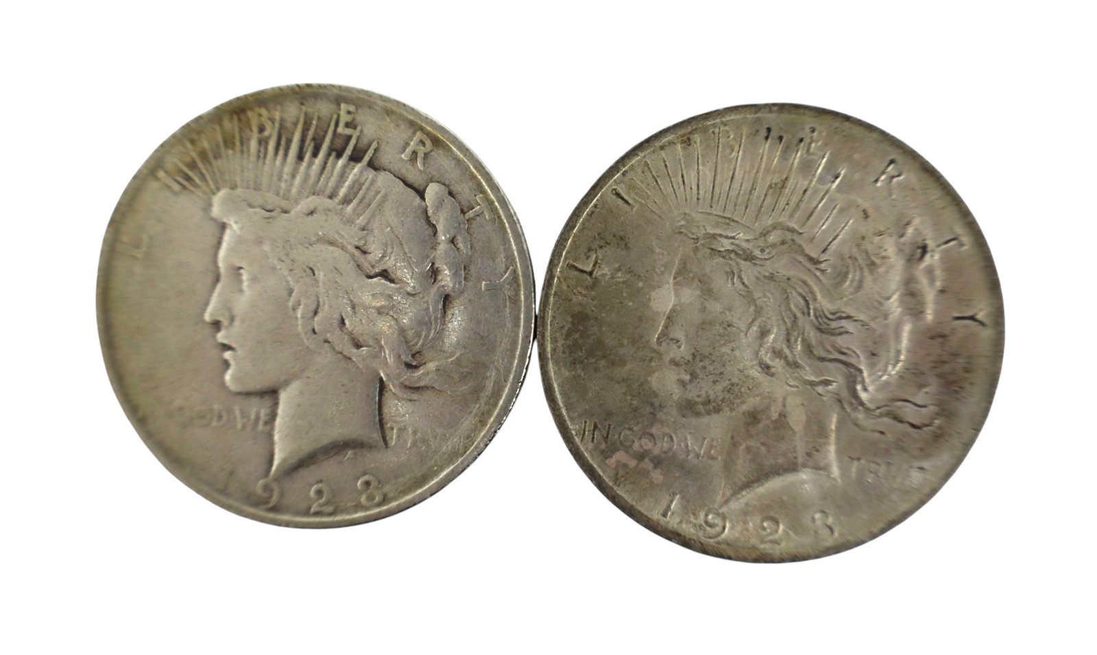 (2) US silver peace dollars $1 dated 1923 & 1923 (1 of 2)