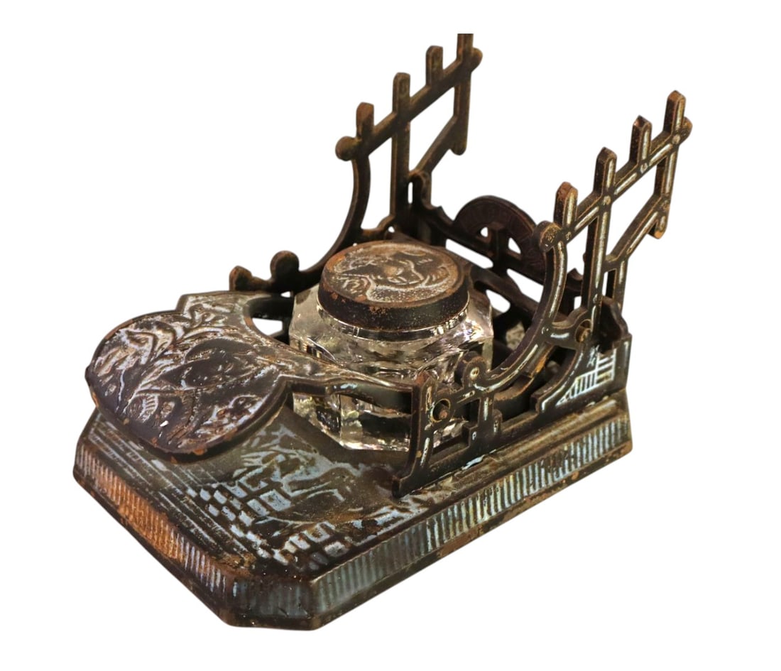 Antique Ornate CI Inkwell Brooks & Co. Royersford PA: Antique ornate cast iron ink well with original glass insert and pen holders by Brooke & Co. Royersford PA. 4.5"h x 4.5"w x 6.5"d