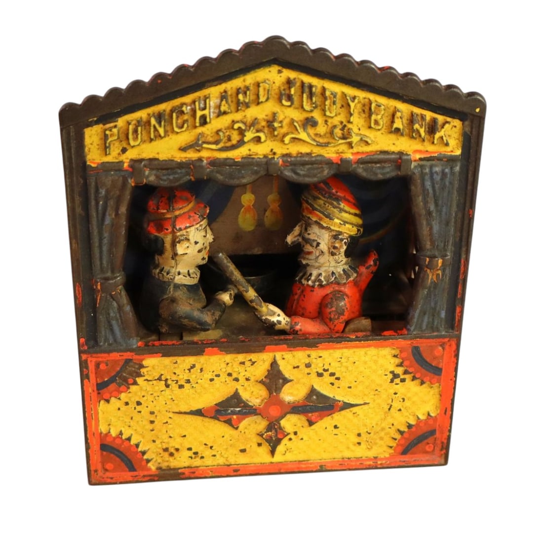 Antique Punch and Judy cast iron mechanical bank: Antique Punch and Judy cast iron mechanical bank, seems to be all original, original paint, structurally sound, seems to be in working order. 7.5"h x 6.5"w x 3.5"d