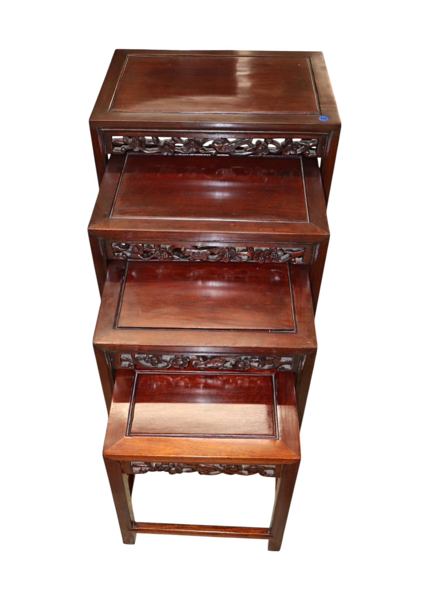 VTG Asian Carved Birds Flower Nesting Tables Set 4: Nice Asian hardwood birds and flower carved set of 4 nesting stack tables, original finish, structurally sound and in good condition for age. Footprint: 26"h x 20"w x 14"d (smallest table 15.5"h x 13"