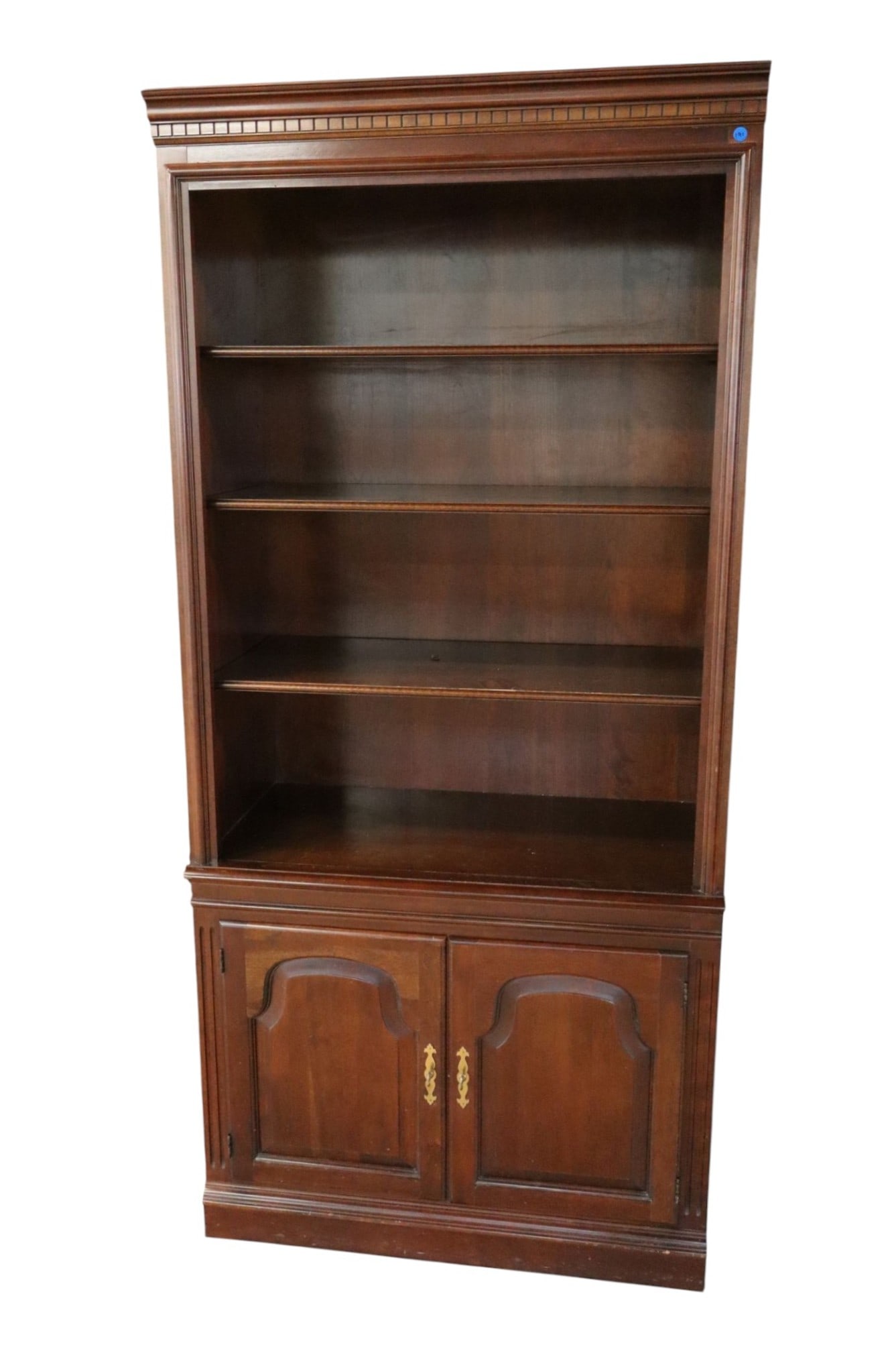 Cherry Open Front Bookcase W/ 2-Door Base Orig Fin: Cherry open front bookcase with 2 door base, original finish, structurally sound and in good condition. 78.5"h x 36"w x 19.5"d