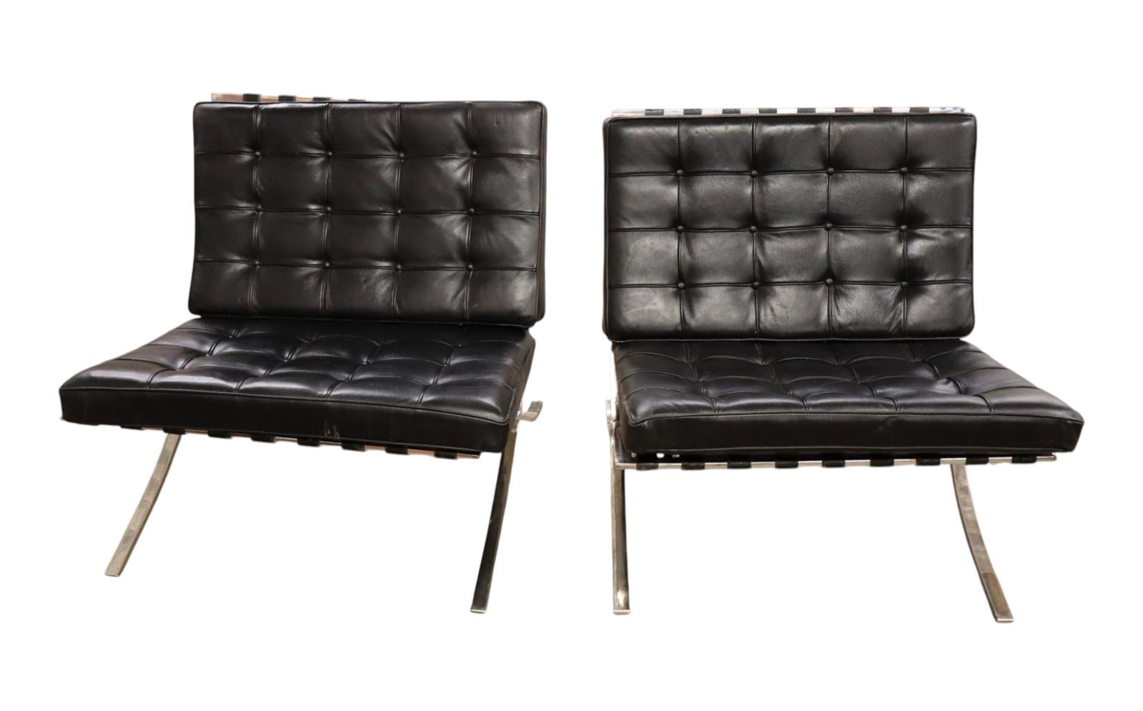 Pr MCM Barcelona Chairs Orig Blk Button Tuft Leather: Vintage pair of mid century modern Barcelona chairs in original black button tuft leather, original webbing looks good, original finish, polished stainless steel bases, structurally sound and in good 
