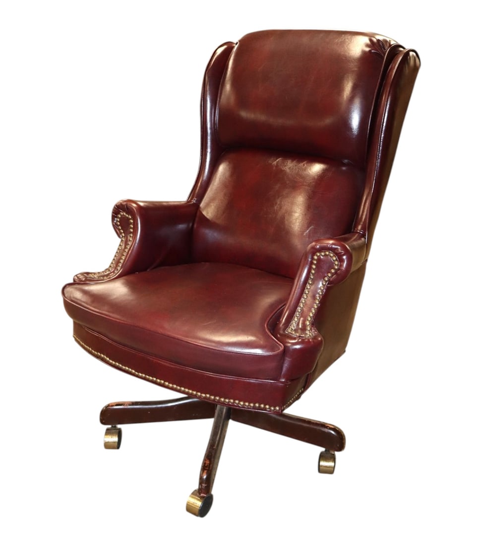 Quality Leather Swivel Adjustable Office Chair: Quality leather swivel and adjustable office chair, structurally sound and in good condition with some wear on bottom carriage and works as should. 46"h x 30"w x 30"d seat height as photo'd is 20"