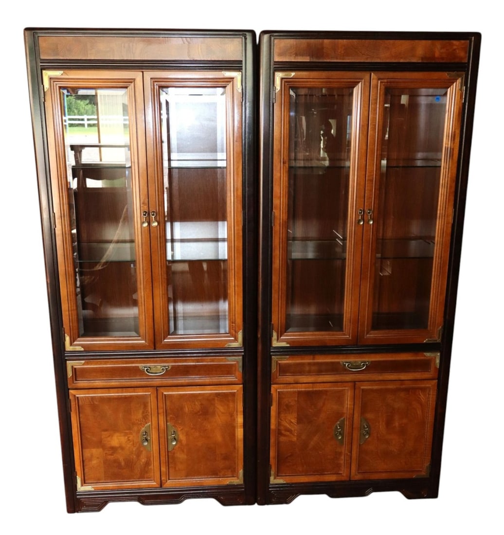 Pr Broyhill Asian Burl Wal Display Cabinets: Pair of Broyhill Asian inspired burl walnut display cabinets with server style bases, beveled glass, original finish, structurally sound and in good condition. Ea. 76"h x 32"w x 18"d