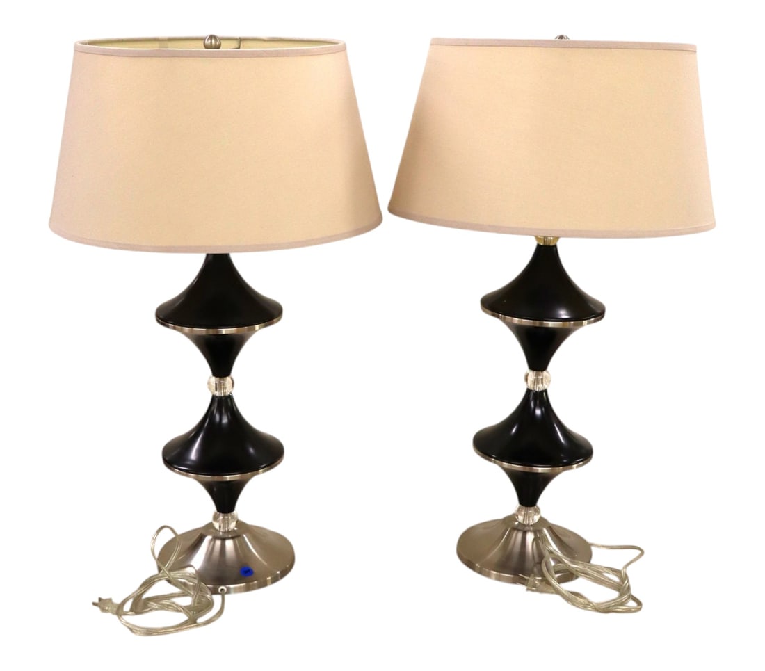 Pr Modern Lucite Stainless Steel Table Lamps: Pair of modern design table lamps with shade in lucite, stainless steel and black. Ea. 30.5"h x 18" diameter base, shades 9.5"h x 18" diameter