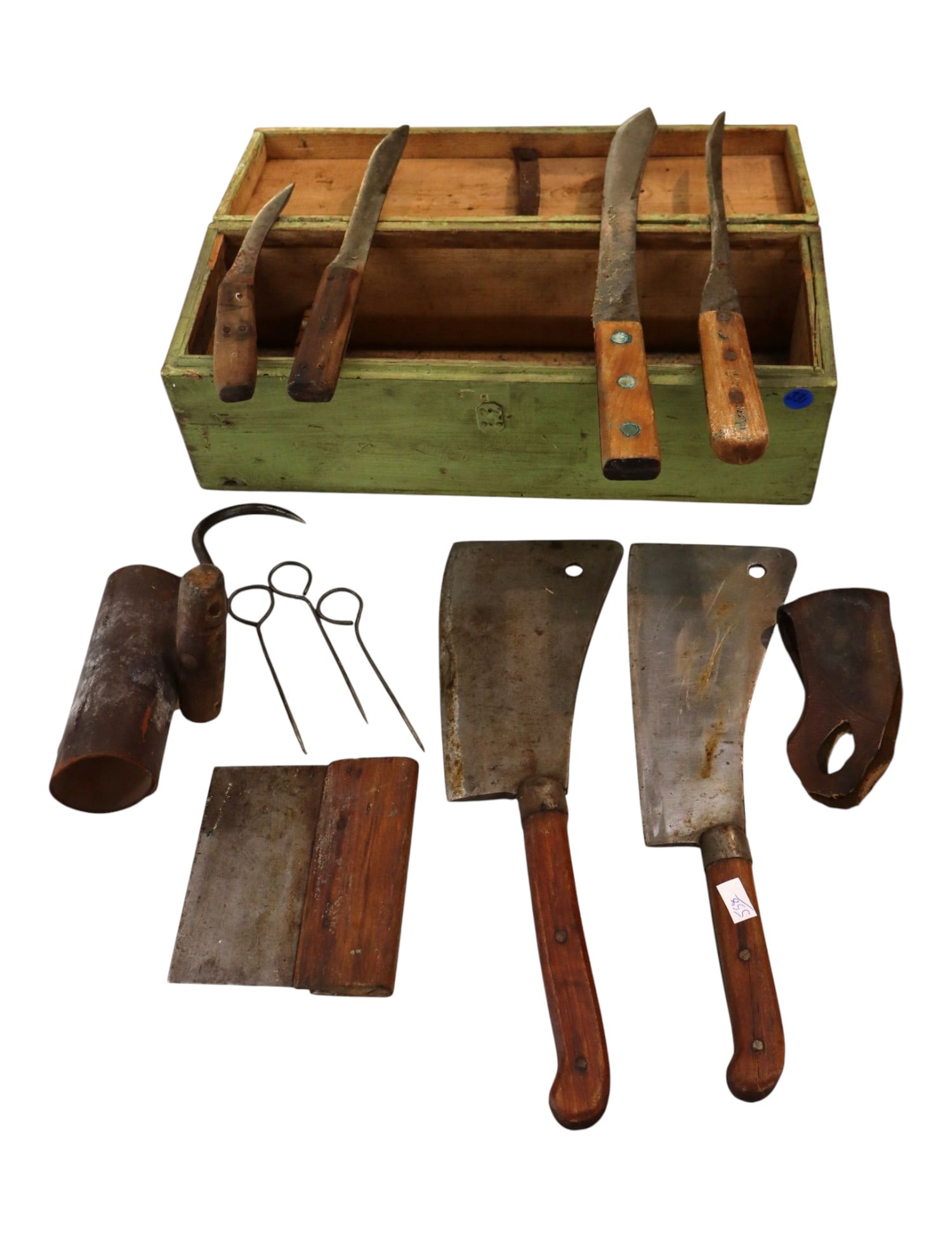14-piece Nichols Bros traveling butcher kit: Fine late 19th-century primitive butcher shop tool collection highlighted by two antique Nichols Bros Greenfield, Mass carbon steel meat cleavers. The comprehensive 14-piece lot packs into the include