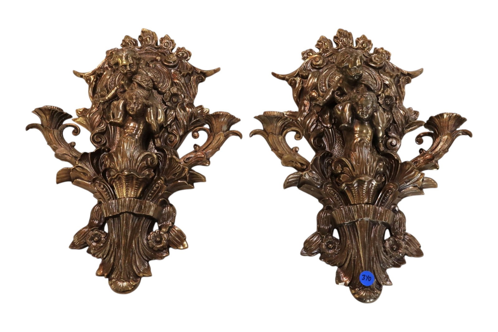 Pr vtg IT bronze style finish cherub candle sconces: Pair of vintage Italian bronze style finish 2 burner cherub candle sconces. 17"h x 12"w x 4"d