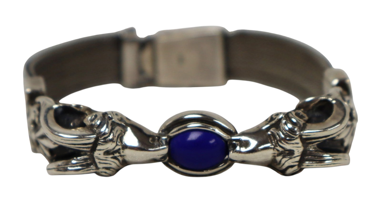 Unique s/s rams head bracelet with lapis stone: Sterling silver rams head bracelet with lapis stone and great security clasp 7.25" 1.13 ozt