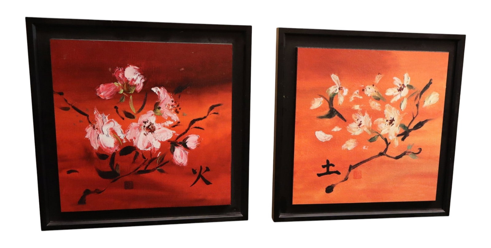 Asian decorative fire and earth Asian plaques: Pair of Asian inspired floral signed artwork fire and earth decorative plaques, structurally sound and in good condition with no noticeable issues. Frames 19.5"h x 19.5"w