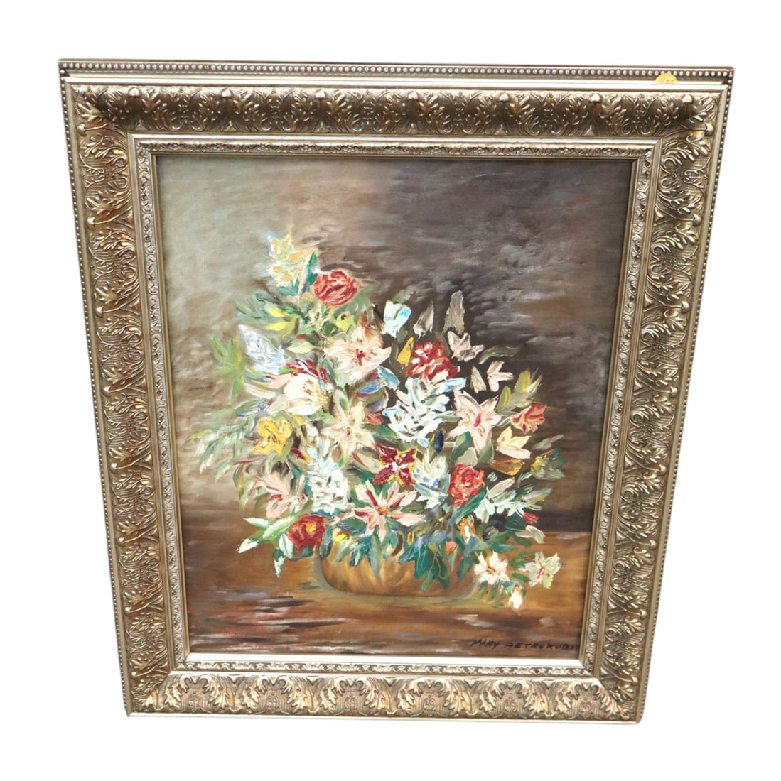 Mary Petrukubi Original Floral Oil Painting Frame: Original 1967 mid-century oil on canvas floral still life painting signed Mary Petrukubi. Vibrant textured bouquet housed in a heavy, ornate silver gilt Rococo style scrolling frame in good condition 