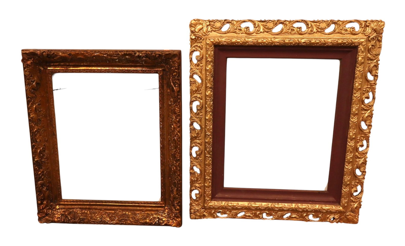 Lot 2 Antique Victorian Gilt Ornate Gesso Frames: Group of 2 antique 19th-C. Victorian style gold gilt gesso-on-wood picture frames. Includes one deep burnished floral cove frame and one large openwork pierced acanthus frame with a maroon liner. 26.5