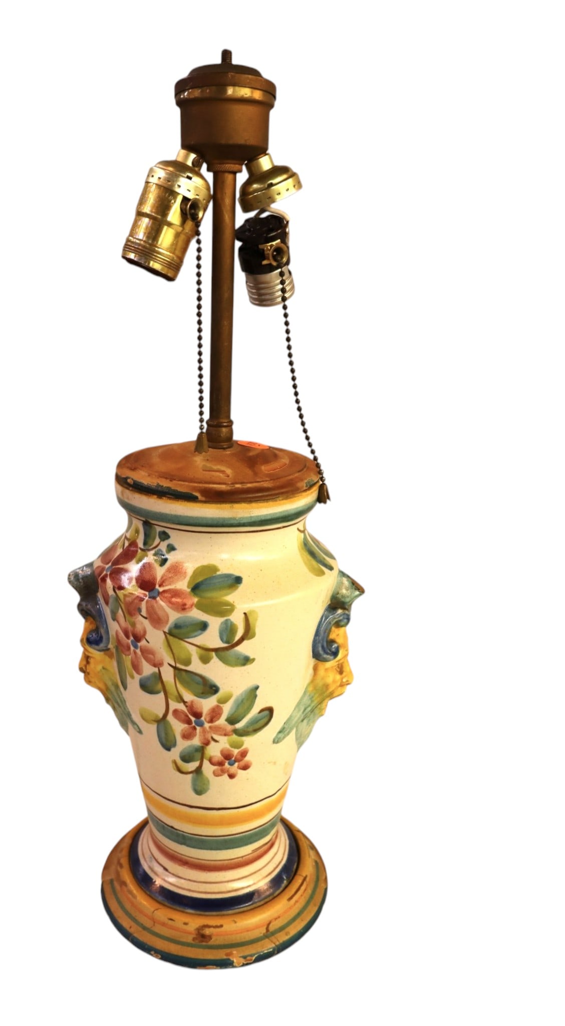 Italian paint decorated table lamp: Italian paint decorated table lamp with some paint loss around base, structurally sound. 20"h x 7" diameter