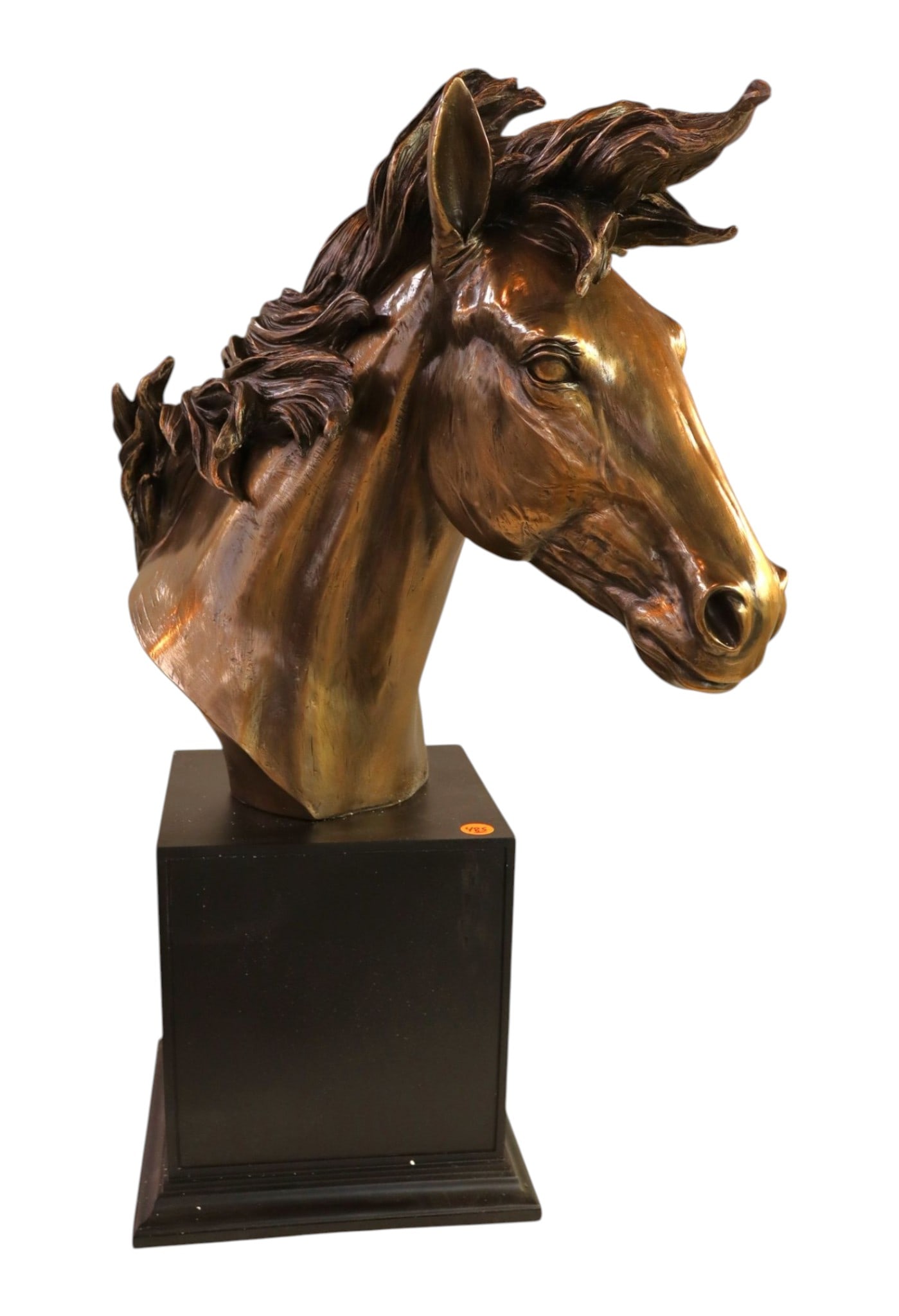 Horse head sculpture on base in composition (1 of 6)