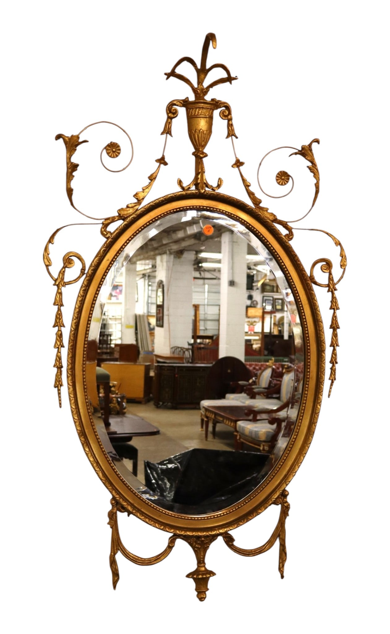 Vintage French ornate mirror in a classical antique gold finish: Vintage French ornate mirror in a classical antique gold finish, beveled glass, original finish, structurally sound and in good condition for age. 42"h x 24.5"w x 2"d