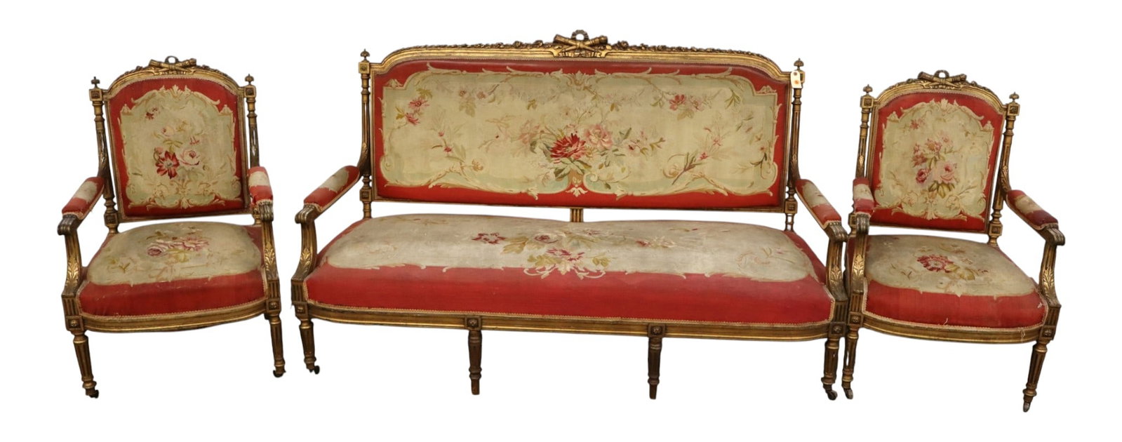 3 piece antique French salon set with original upholstery: 3 piece antique French salon set with original upholstery in gilt wood does show age and wear, structurally sound and original found condition, upholstery needs to be cleaned. Chairs 38"h x 24"w x 22"