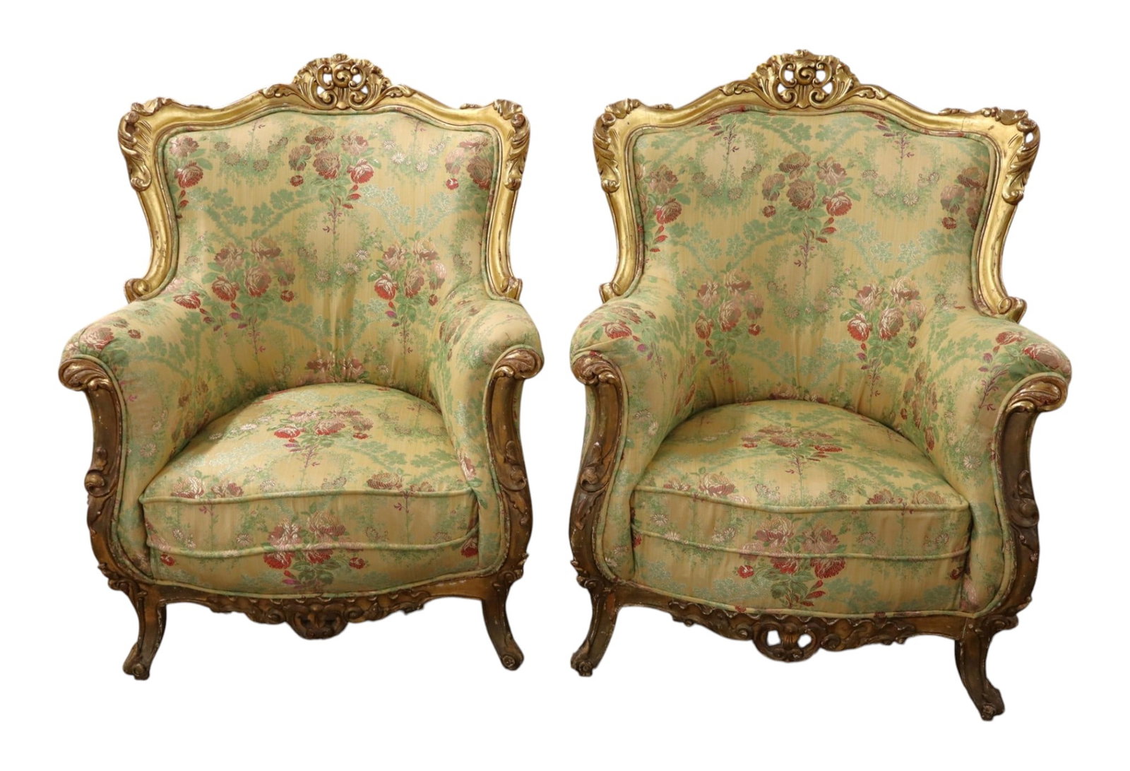Pair of antique French baroque club chairs: Pair of antique French baroque club chairs in wood frame with gold gilt, original finish, structurally sound, upholstery may need cleaned, have age and patina. Ea. 42"h x 33"w x 24"d seat height 17"