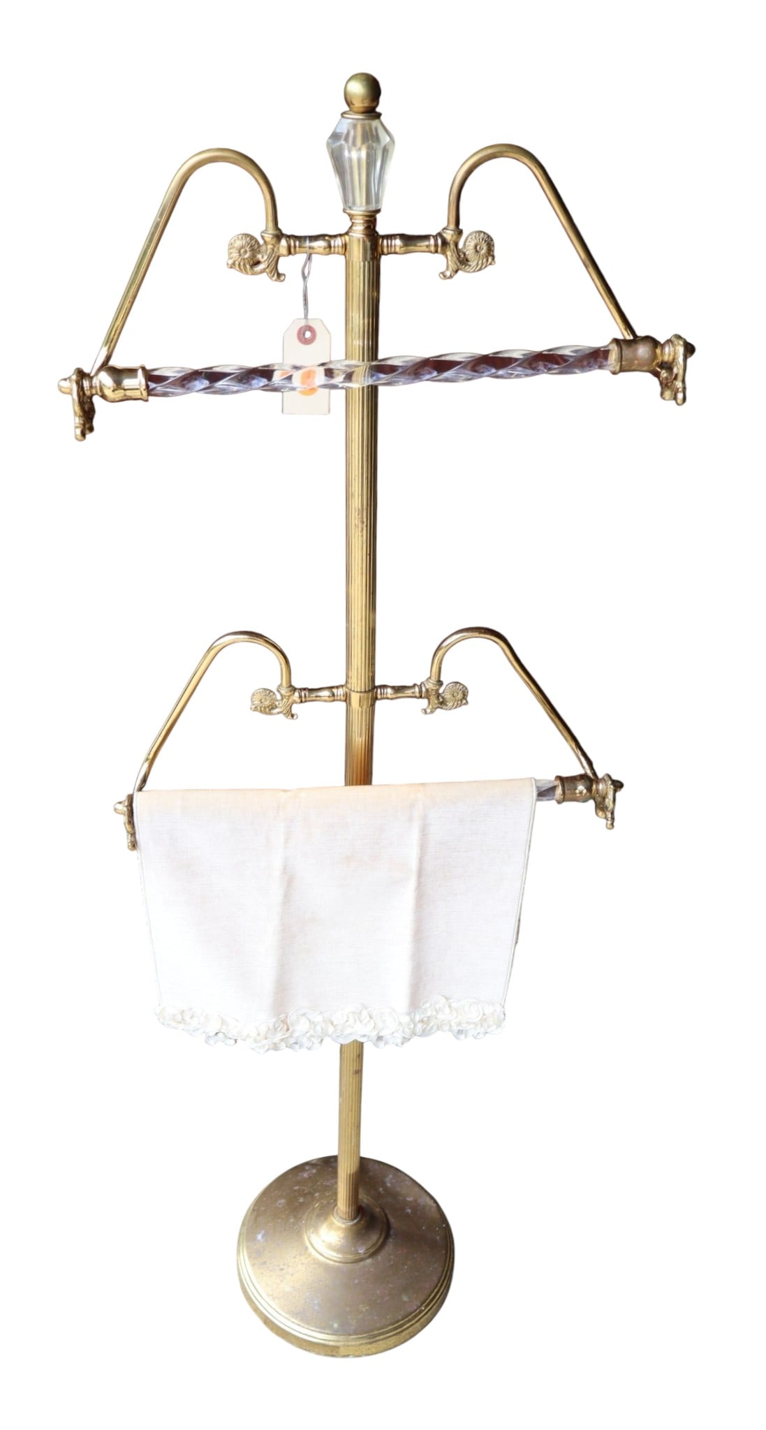 Vintage brass 2 tier towel rack: Vintage brass 2 tier towel rack, structurally sound, base has issues see photos. 50"h x 18"w x 10" diameter base