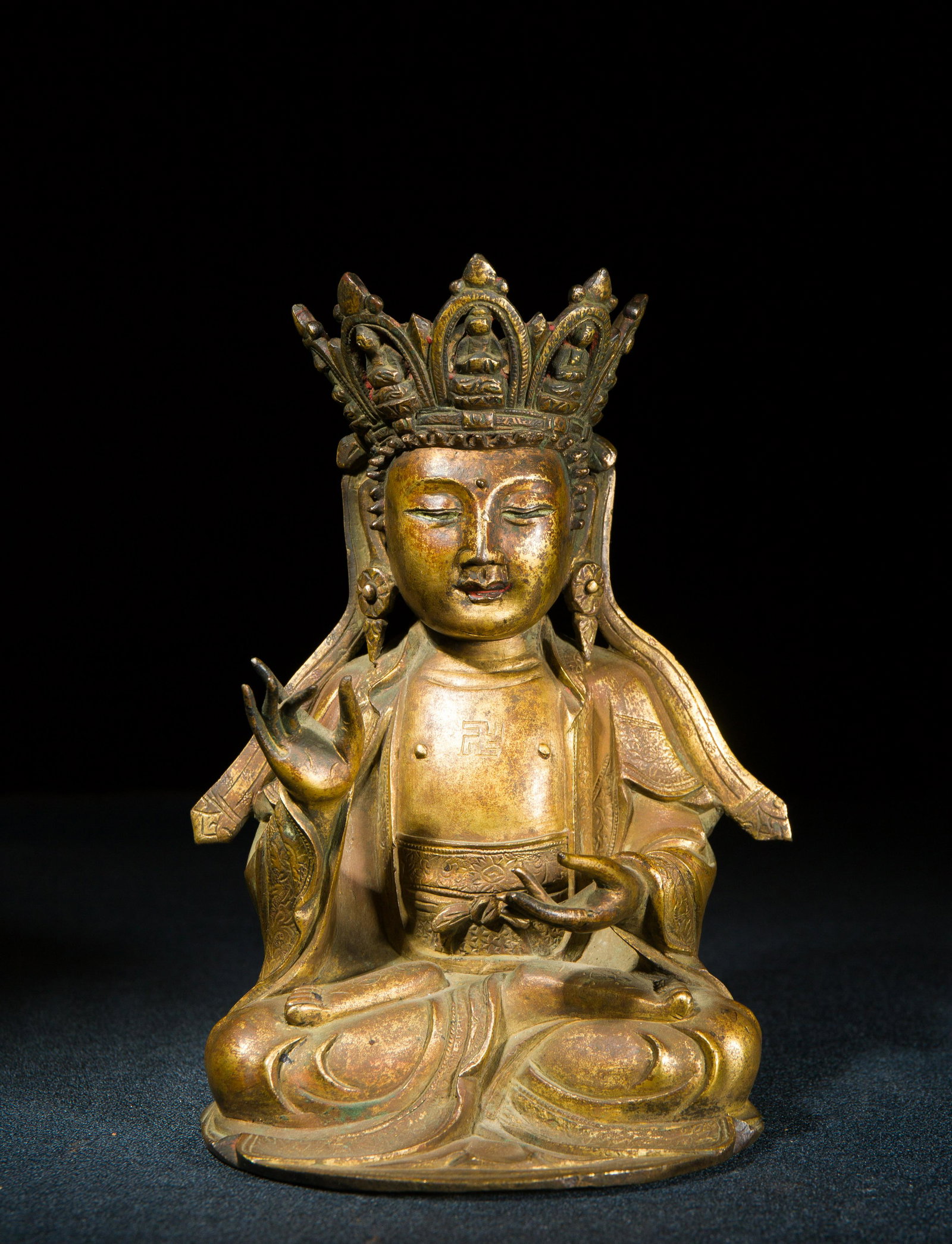A gilt bronze Sakyamuni: Ming dynasty H:19.5cm W:12cm weight:about 1517g CONDITION For condition inquiries please contact us at info@empire-artgallery.com 请注意：购买前请ࡨ