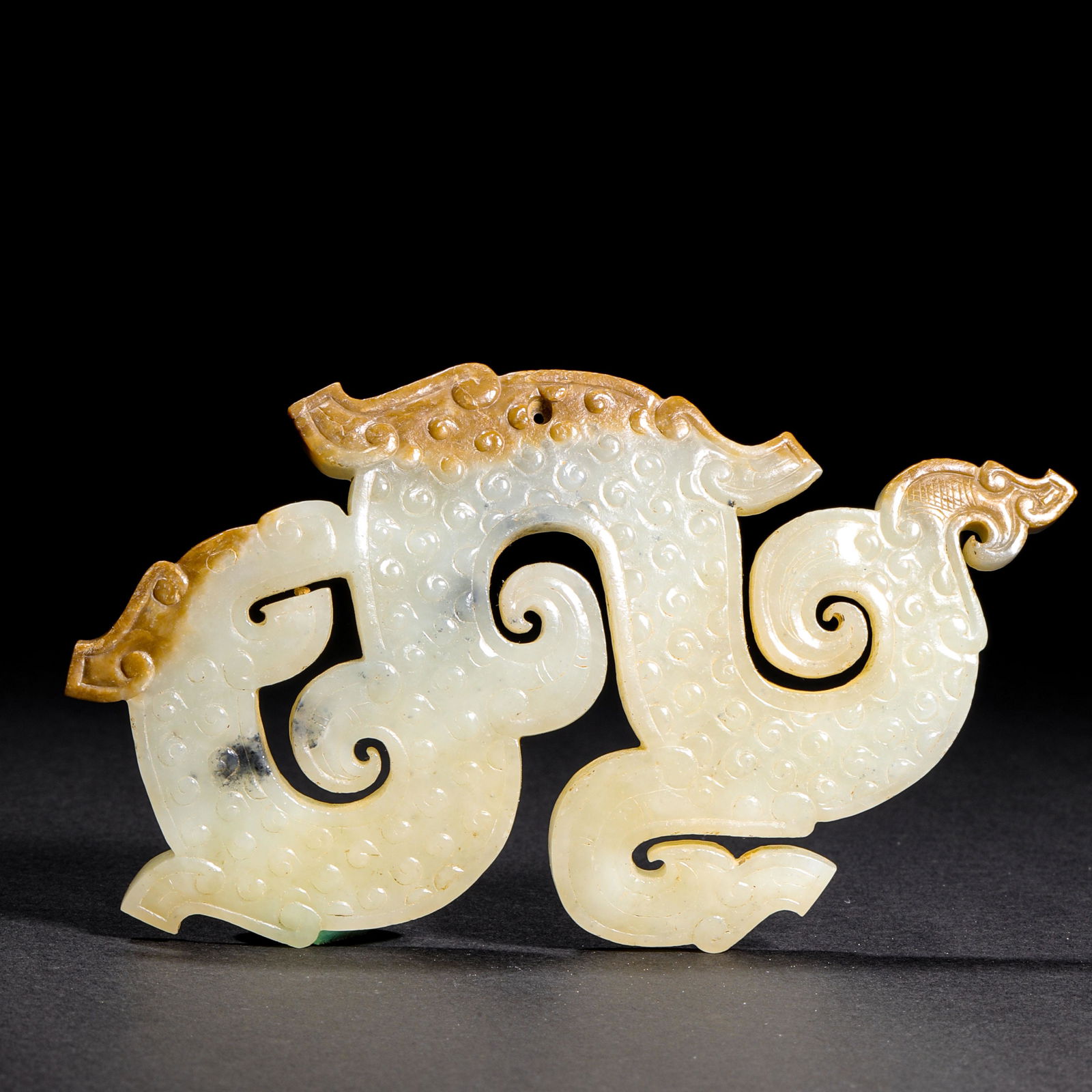 PRE-MING DYNASTY HETIAN JADE ANIMAL PATTERN JADE BI (1 of 14)