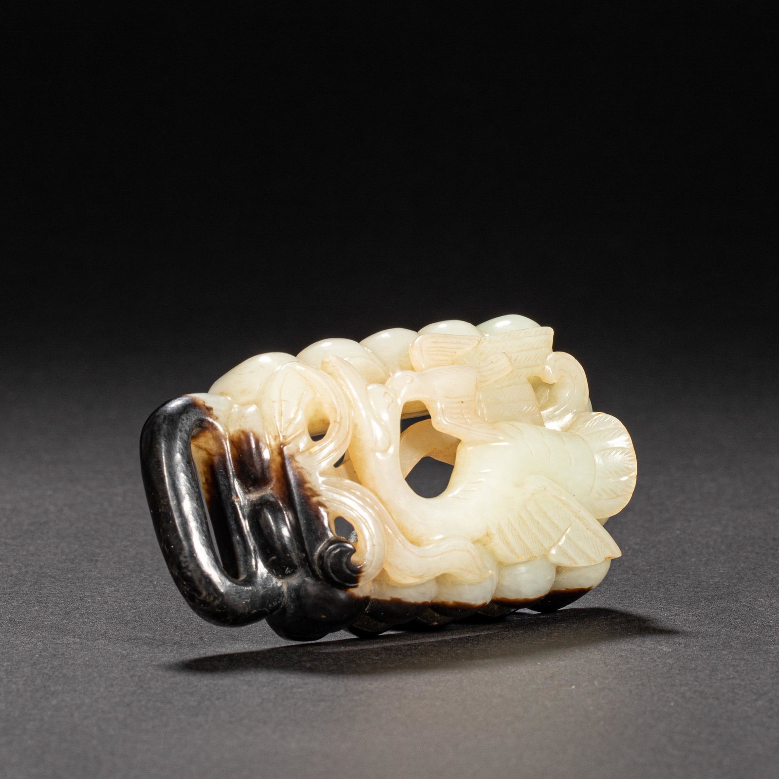 CHINESE HOTAN JADE BELT DECORATED WITH LIAO DYNASTY: CHINESE HOTAN JADE BELT DECORATED WITH LIAO DYNASTY; H. 5 cm. W. 8 cm. Weight 139 gram.