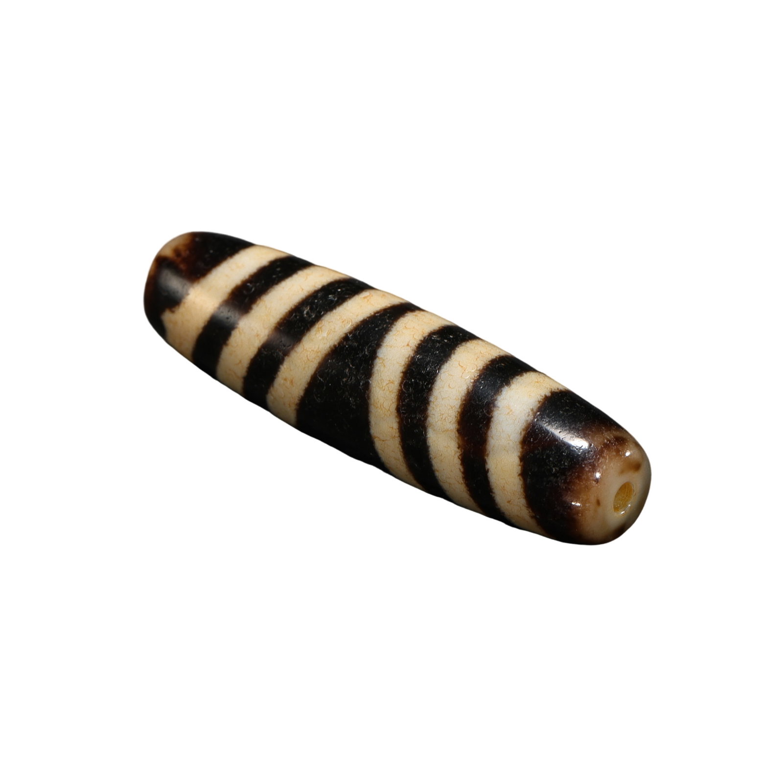Tibetan Dzi Beads from the 15th Century: L. 4.88 cm. W. 1.3 cm. Weight 14 gram.