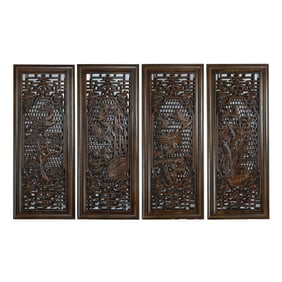 A set of four-panel screens with flower and bird patterns in yellow rosewood from the Qing Dynasty