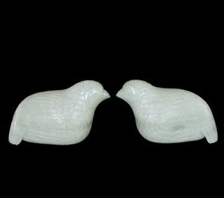 A pair of Hetian white jade quail lidded boxes from the Qing Dynasty
