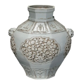 Chinese Yuan Dynasty white glaze carved double beasts jar