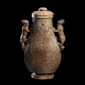 Chinese Han Dynasty blue-white jade double beast ear cover bottle