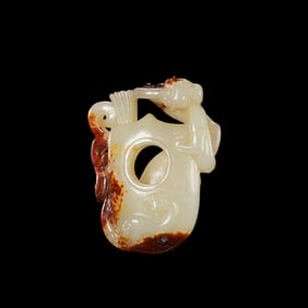 Chinese Han Dynasty white jade red-stained dragon heart pendant