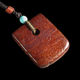 Chinese Han Dynasty jade beast-faced pendant
